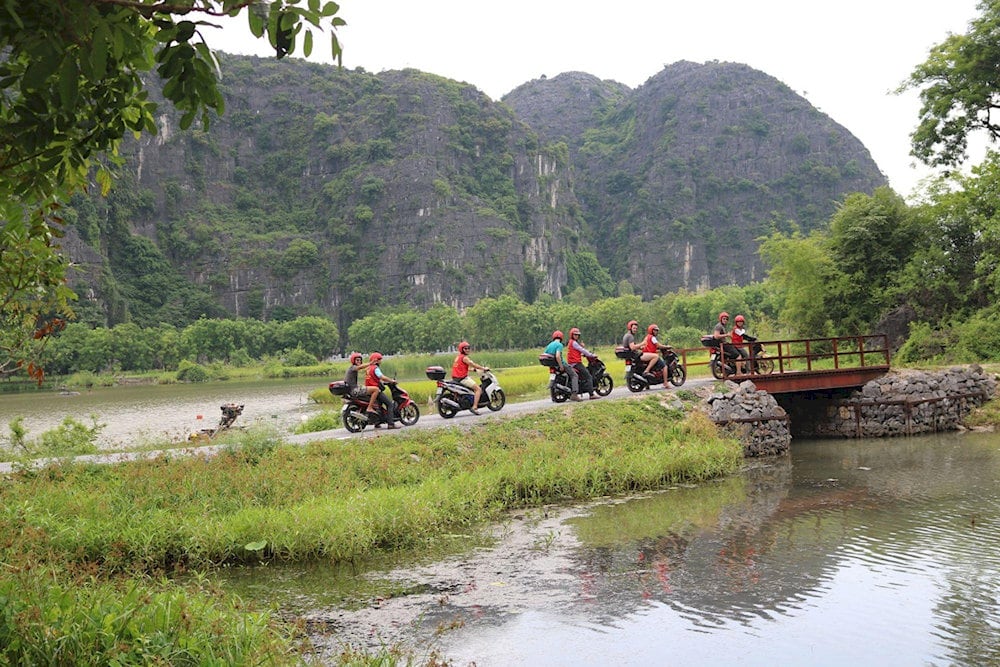 Motorbikes are an ideal choice to reach Phat Diem Cathedral
